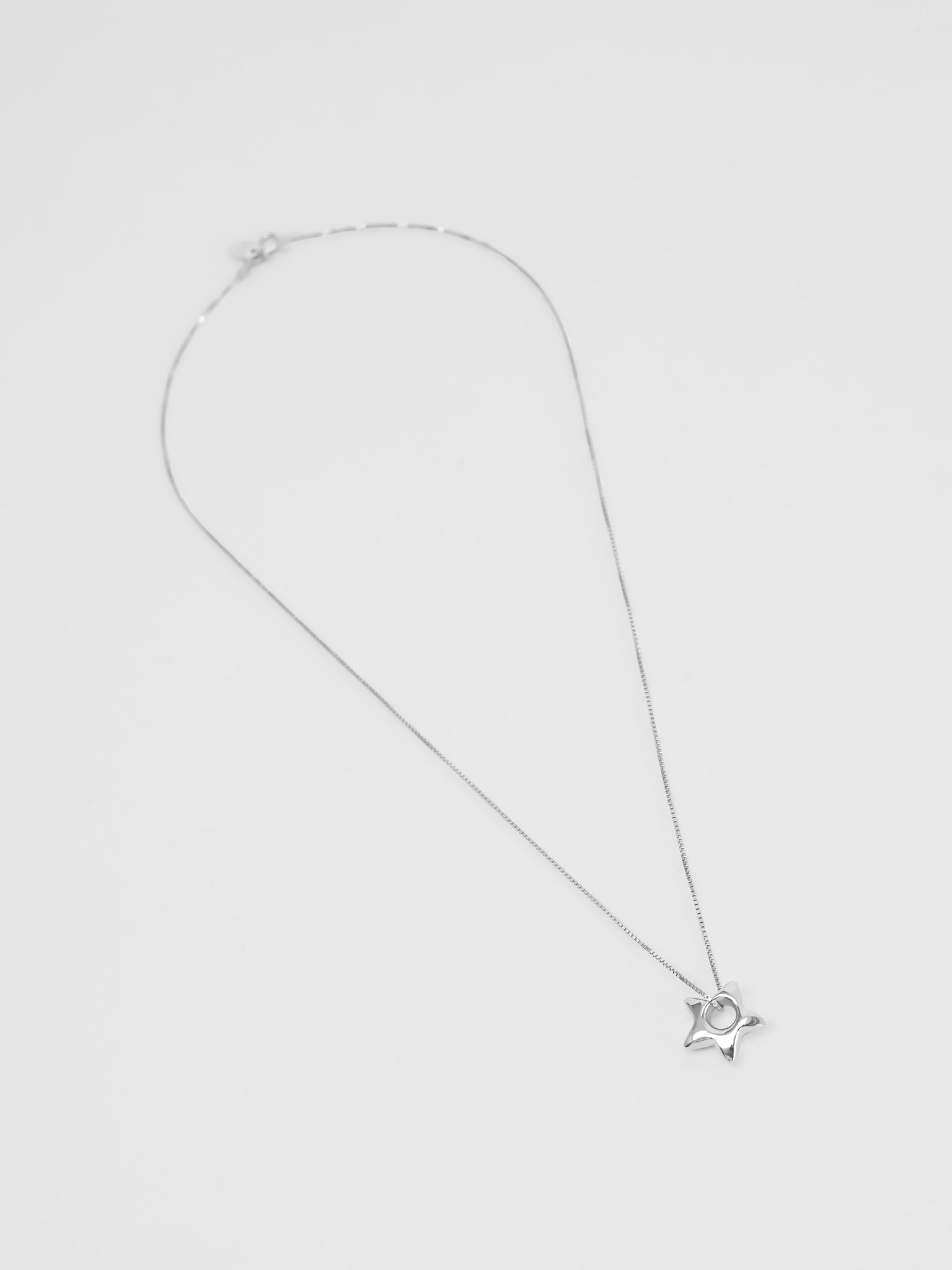 Star Charm Necklace in Sterling Silver